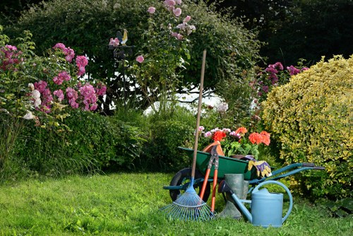 Training session for garden maintenance staff demonstrating pruning techniques